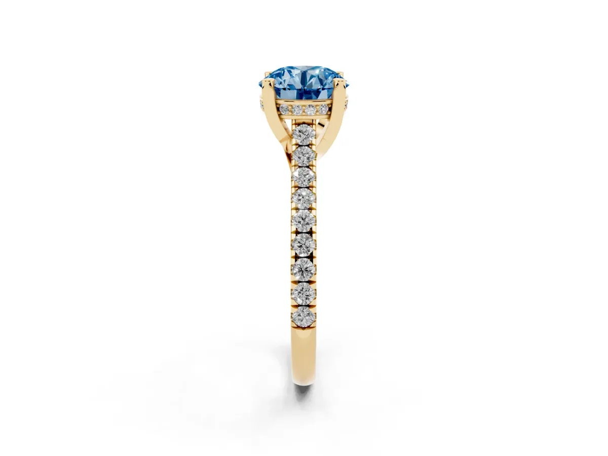 Fancy Blue Round Cut Brilliant Diamond Solitaire with Pavé Band and Four-Prong Setting Yellow gold