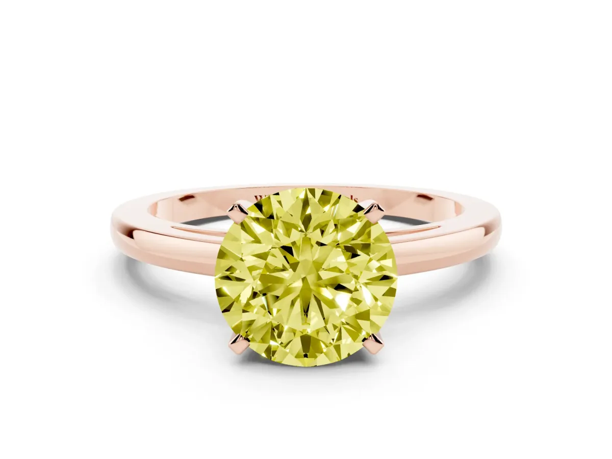 Fancy Yellow Round Cut Solitaire Diamond Engagement Ring with Four-Prong Setting on a Classic Band Rose gold
