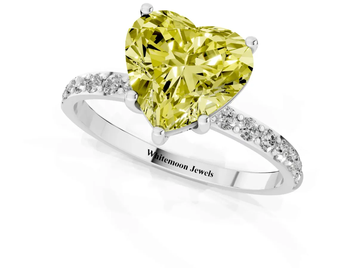 Fancy Yellow Heart Cut Diamond Solitaire Ring with Round Pavé Shoulders and Prong Setting Silver