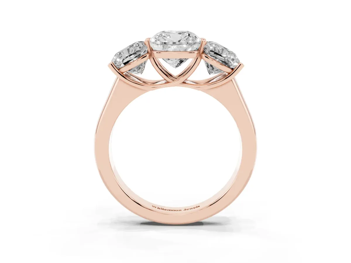 Cushion Cut Three-Stone Diamond Ring with Prong Setting on a Classic Band Rose gold