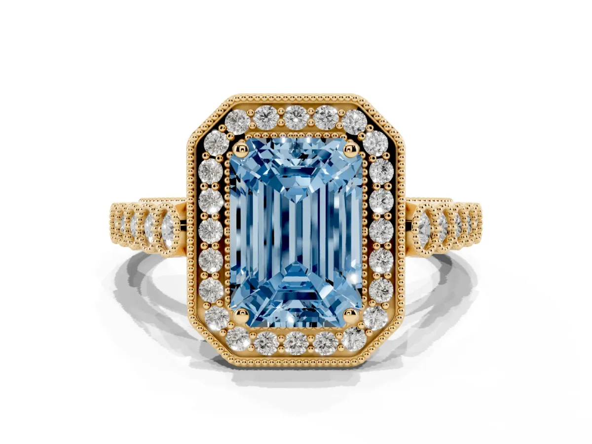 Fancy Blue Emerald Cut Halo Milgrain Solitaire with Bezel Set Side Stones and Pave Band Yellow gold