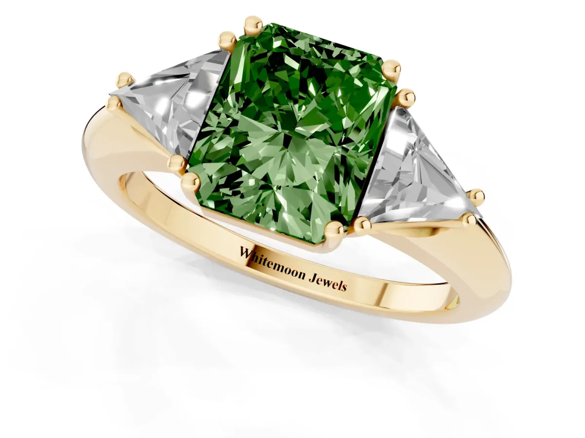 Fancy Green Three-Stone Radiant Cut Diamond Engagement Ring with Trillion Side Stones and Prong Setting Yellow gold