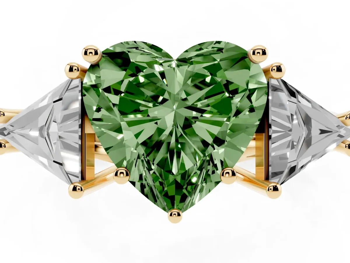 Fancy Green Three-Stone Heart Cut Diamond Engagement Ring with Trillion Side Stones and Prong Setting Yellow gold