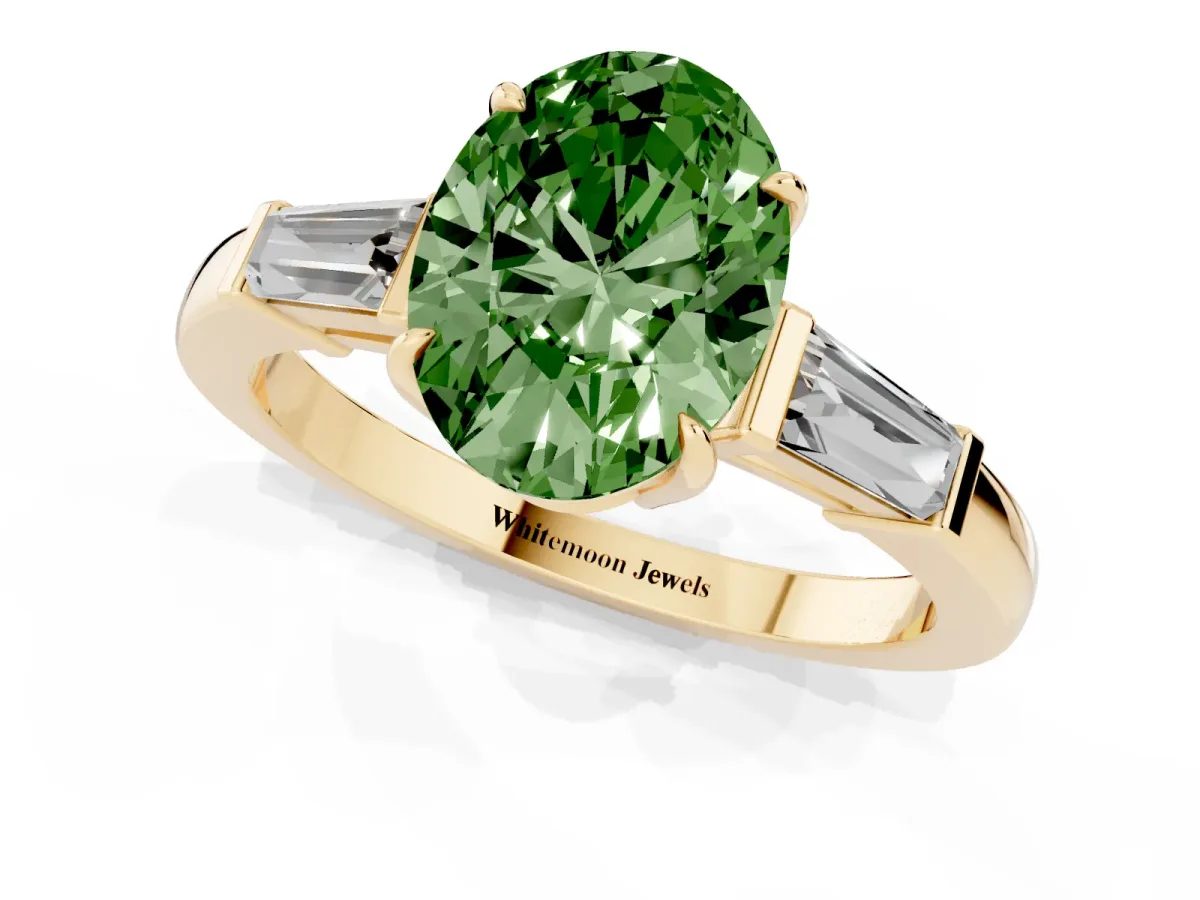 Fancy Green Oval Cut Diamond Three-Stone Ring with Tapered Baguette Side Stones and Prong Setting Yellow gold