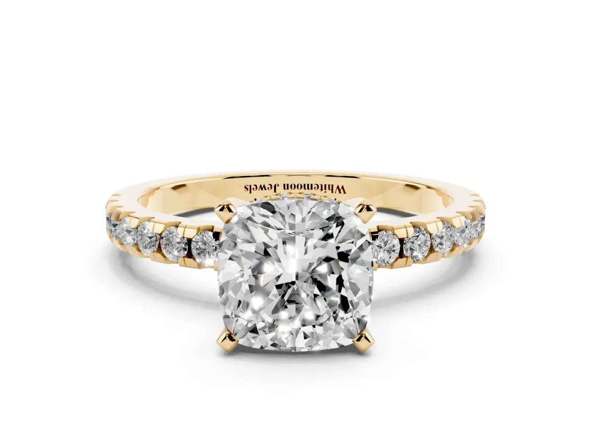 Cushion Cut Diamond Solitaire Ring with Round Pavé Band and Four-Prong Setting Yellow gold