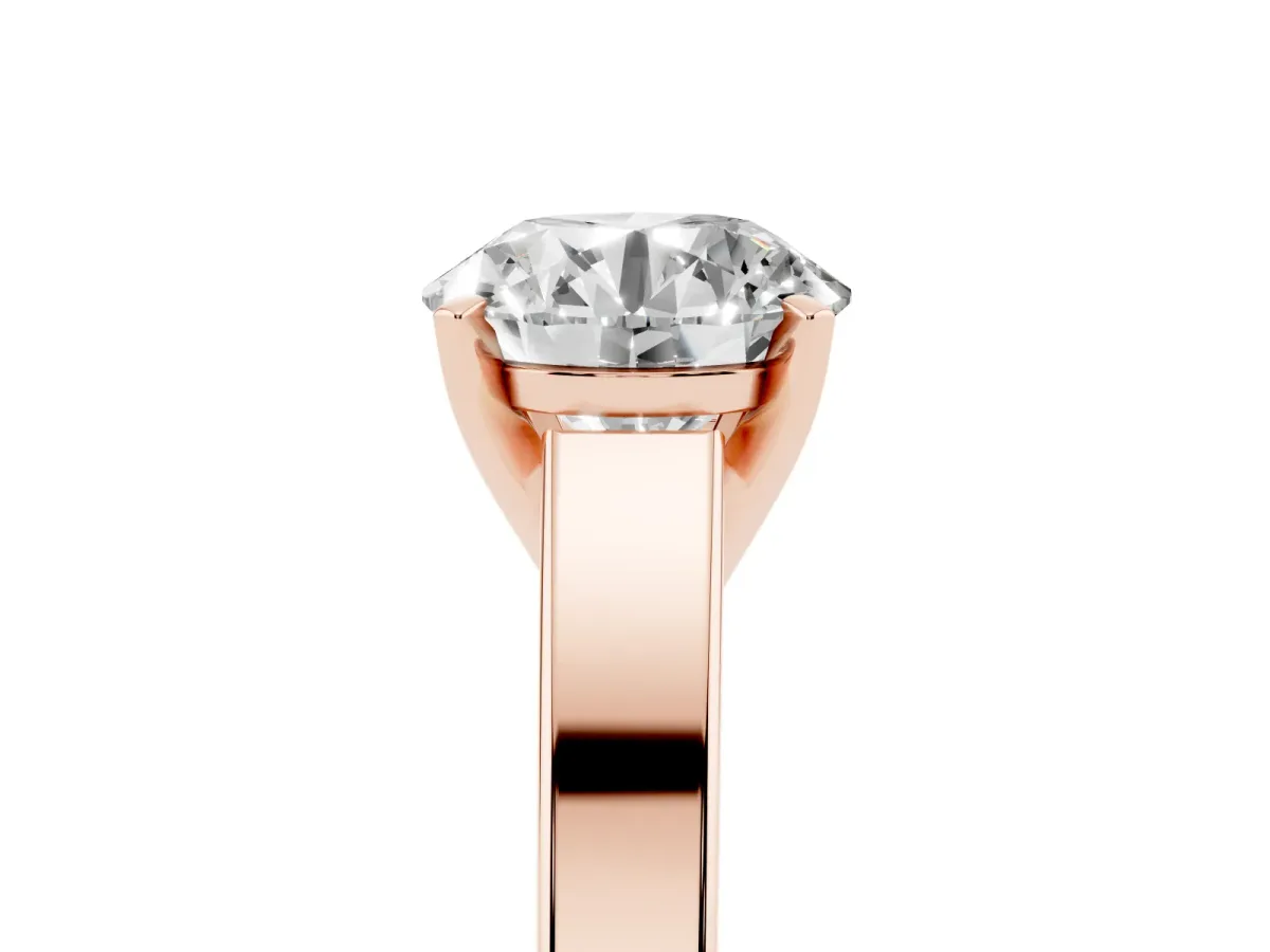 Round Cut Solitaire Engagement Ring with Four-Prong Setting and Tapered Band Rose gold
