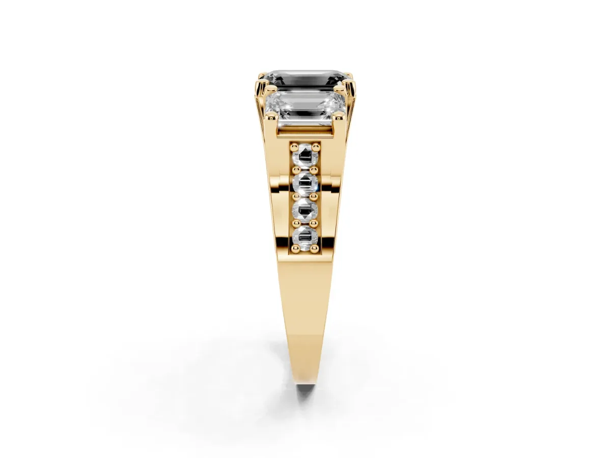 Fancy Black Emerald Cut Diamond Three-Stone Ring with Channel Set Band and Four-Prong Setting Yellow gold