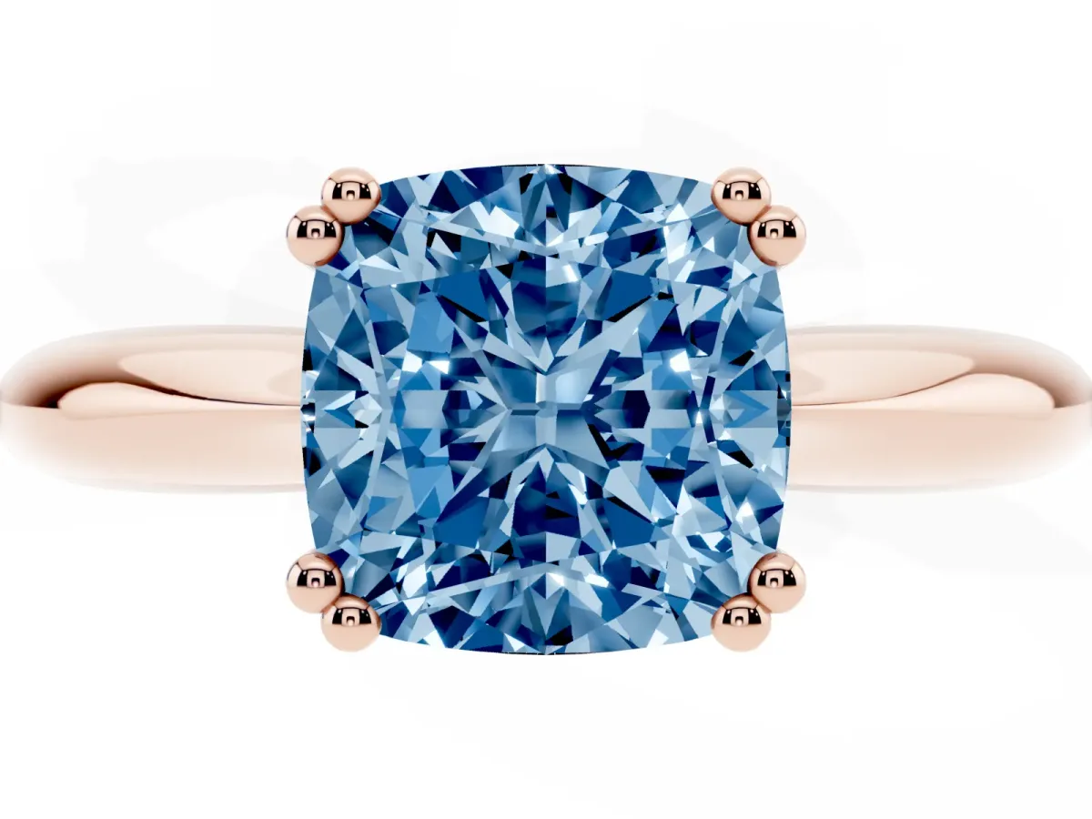 Fancy Blue Cushion Cut Cut Solitaire Engagement Ring with Tapered Band and Four-Prong Setting Rose gold
