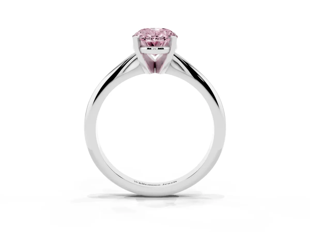 Fancy Pink Oval Cut Cut Solitaire Ring with Four-Prong Setting on a Classic Band Silver