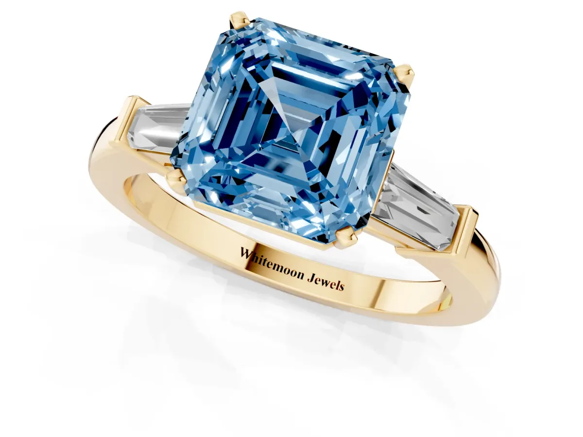 Fancy Blue Asscher Cut Cut Diamond Solitaire Ring with Tapered Baguette Accents and Four-Prong Setting Yellow gold