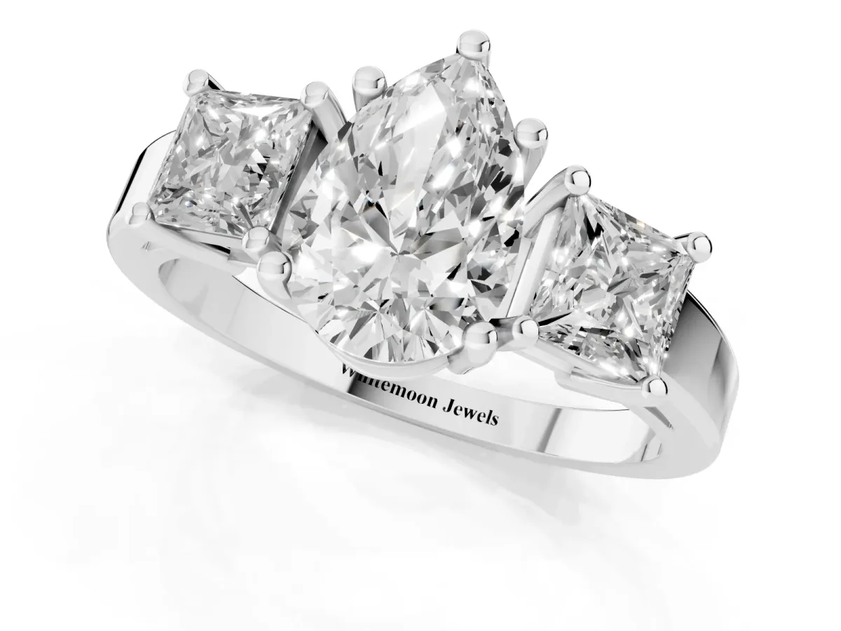 Three-Stone Pear Cut Cut Solitaire Ring with Prong Setting Platinum