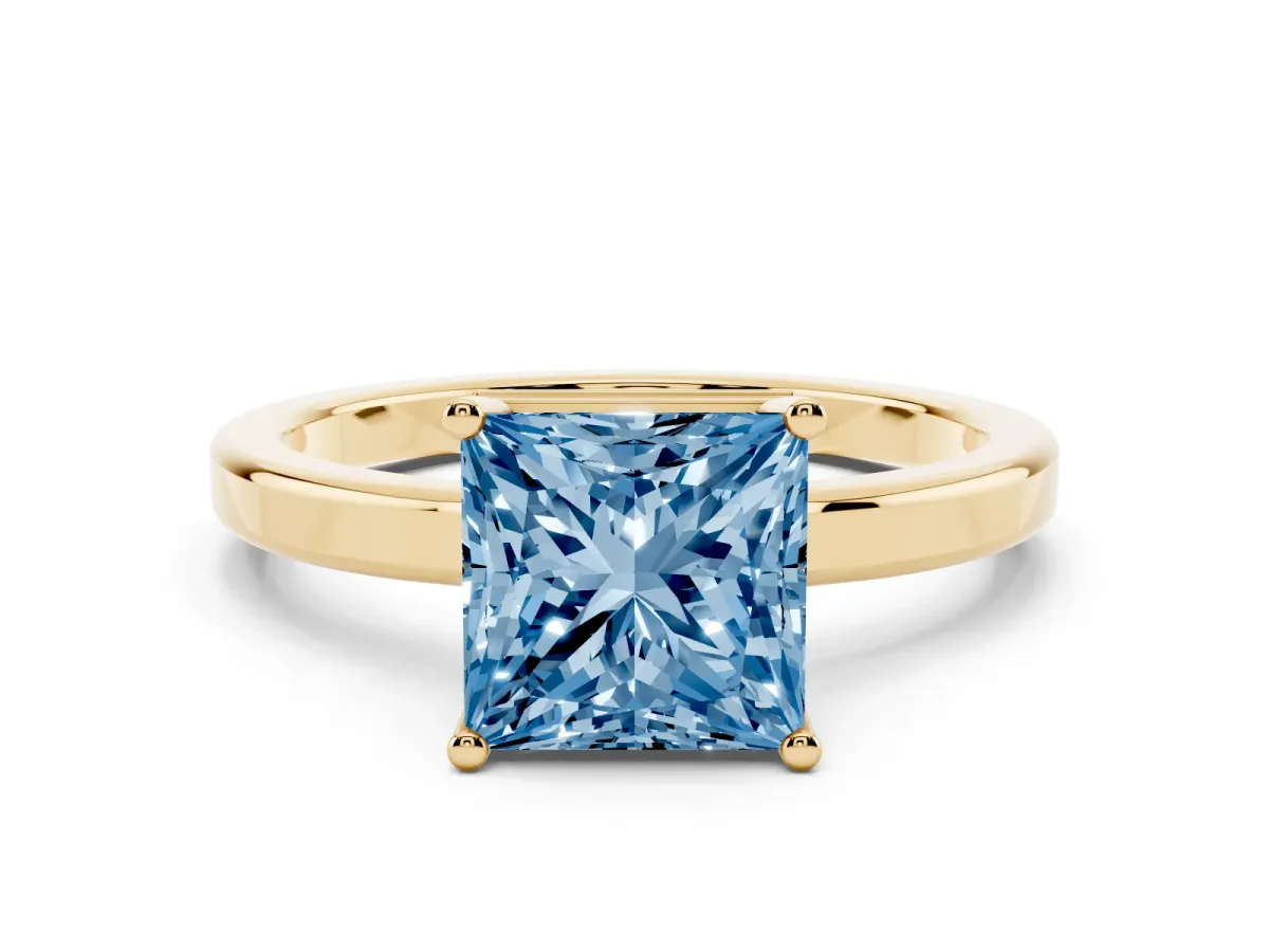 Fancy Blue Princess Cut Cut Solitaire Engagement Ring with Four-Prong Setting on a Classic Band Yellow gold