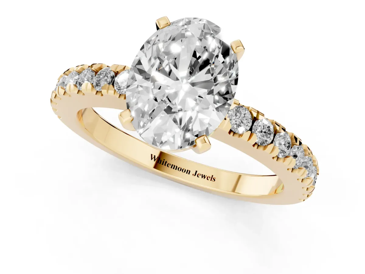 Oval Cut Solitaire Diamond with Pavé Band and Four-Prong Setting Yellow gold