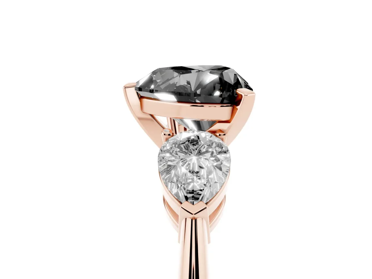 Fancy Black Three-Stone Heart Cut Diamond Ring with Pear Side Stones and Four-Prong Setting Rose gold