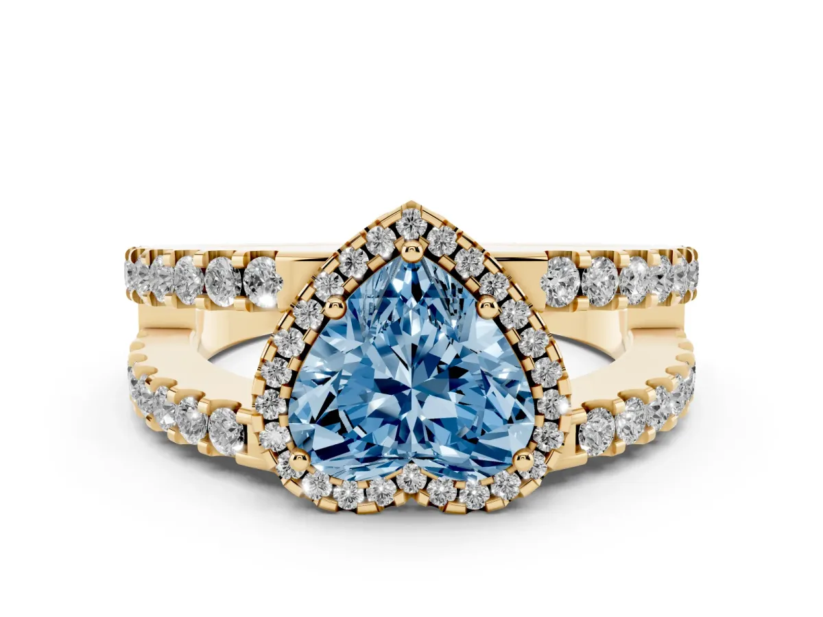 Fancy Blue Heart Cut Cut Halo Split Shank Diamond Ring with Four-Prong Setting Yellow gold