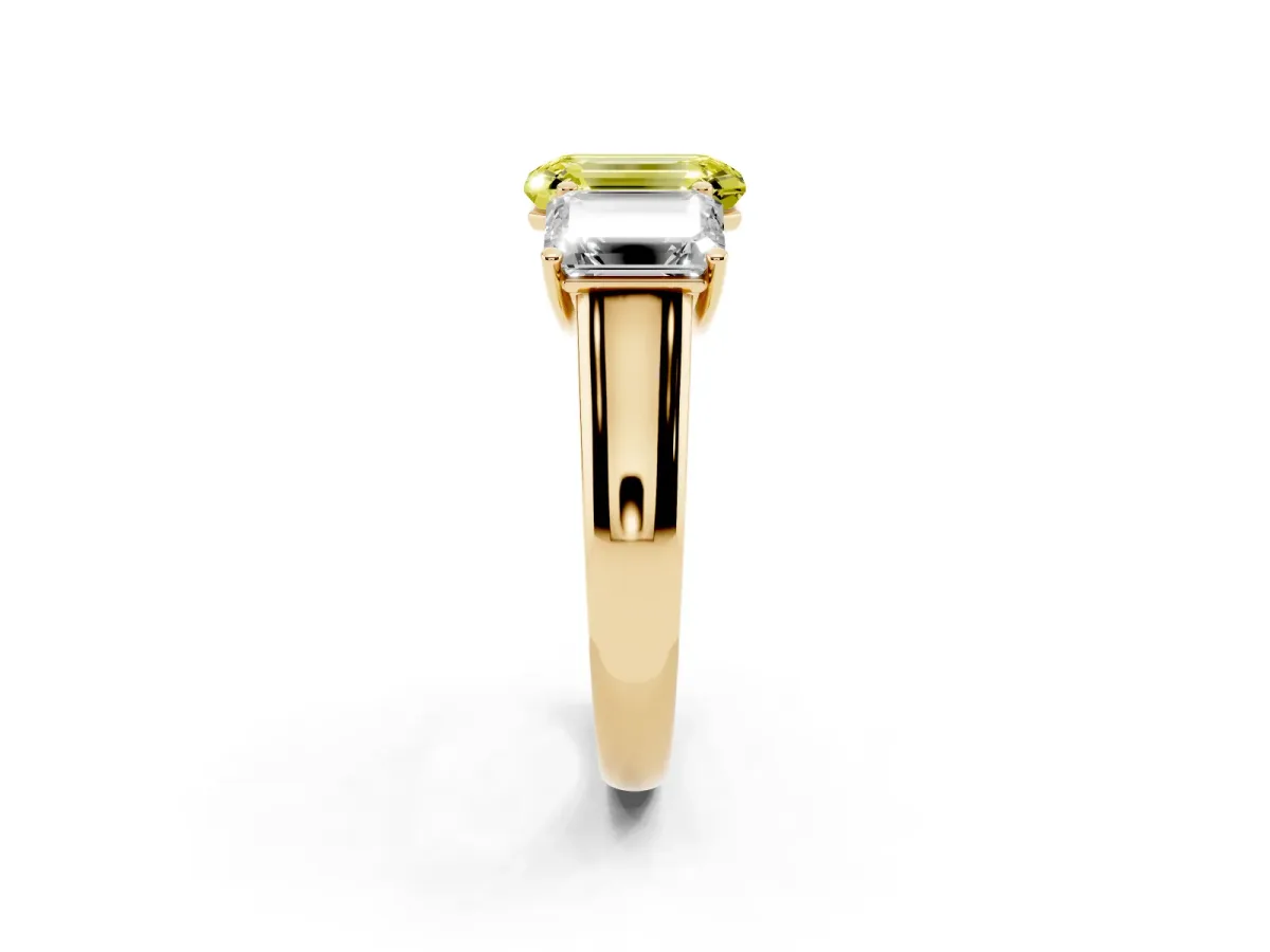 Fancy Yellow Emerald Cut Three-Stone Diamond Ring with Prong Setting on a Classic Band Yellow gold