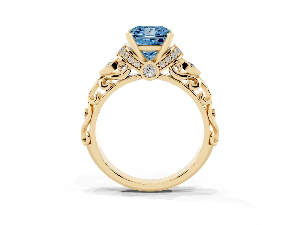 Fancy Blue Princess Cut Diamond Solitaire Ring with Filigree Band and Four-Prong Setting Yellow gold