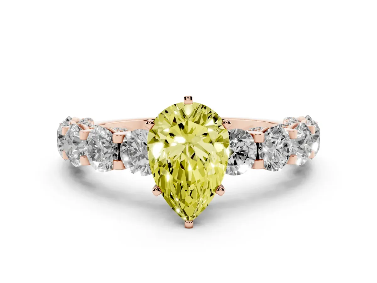 Fancy Yellow Pear Cut Diamond Side Stone Engagement Ring with Four-Prong Setting Rose gold