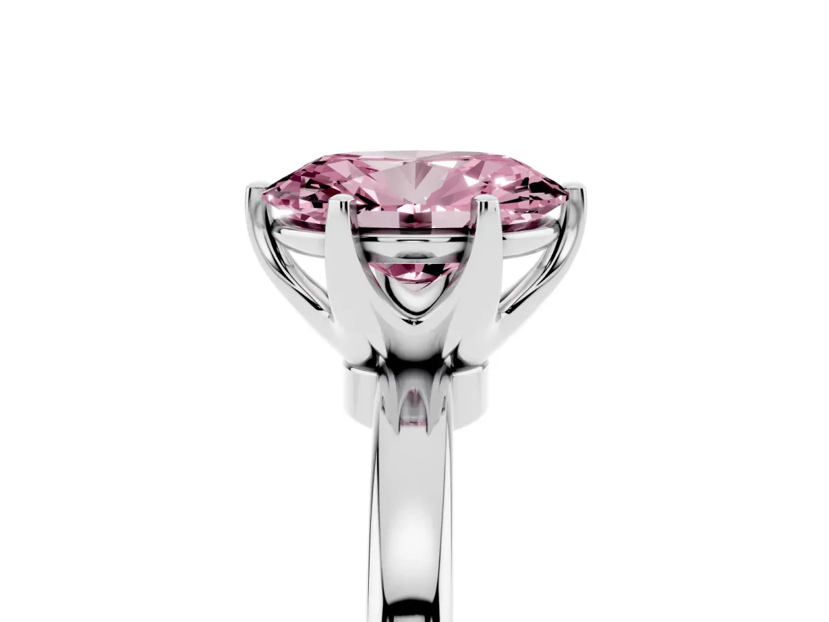 Fancy Pink Oval Cut Solitaire Diamond Ring with Six-Prong Setting on a Classic Band Silver