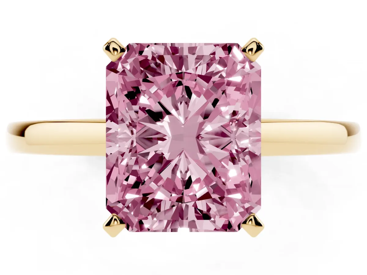 Fancy Pink Radiant Cut Solitaire Diamond Engagement Ring with Four-Prong Setting on a Classic Band Yellow gold