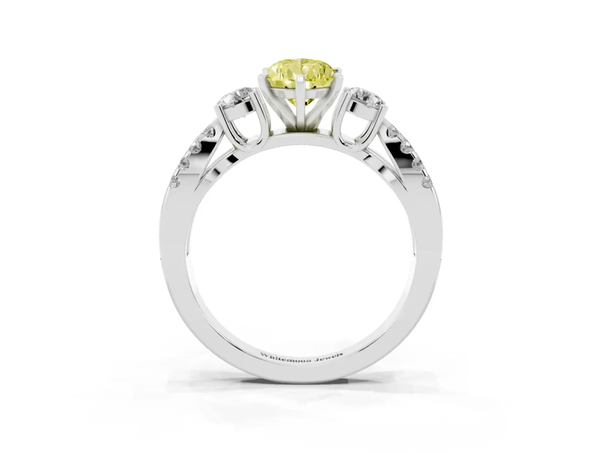 Fancy Yellow Pear Cut Diamond Three-Stone Ring with Pavé Split Shank and Four-Prong Setting Silver