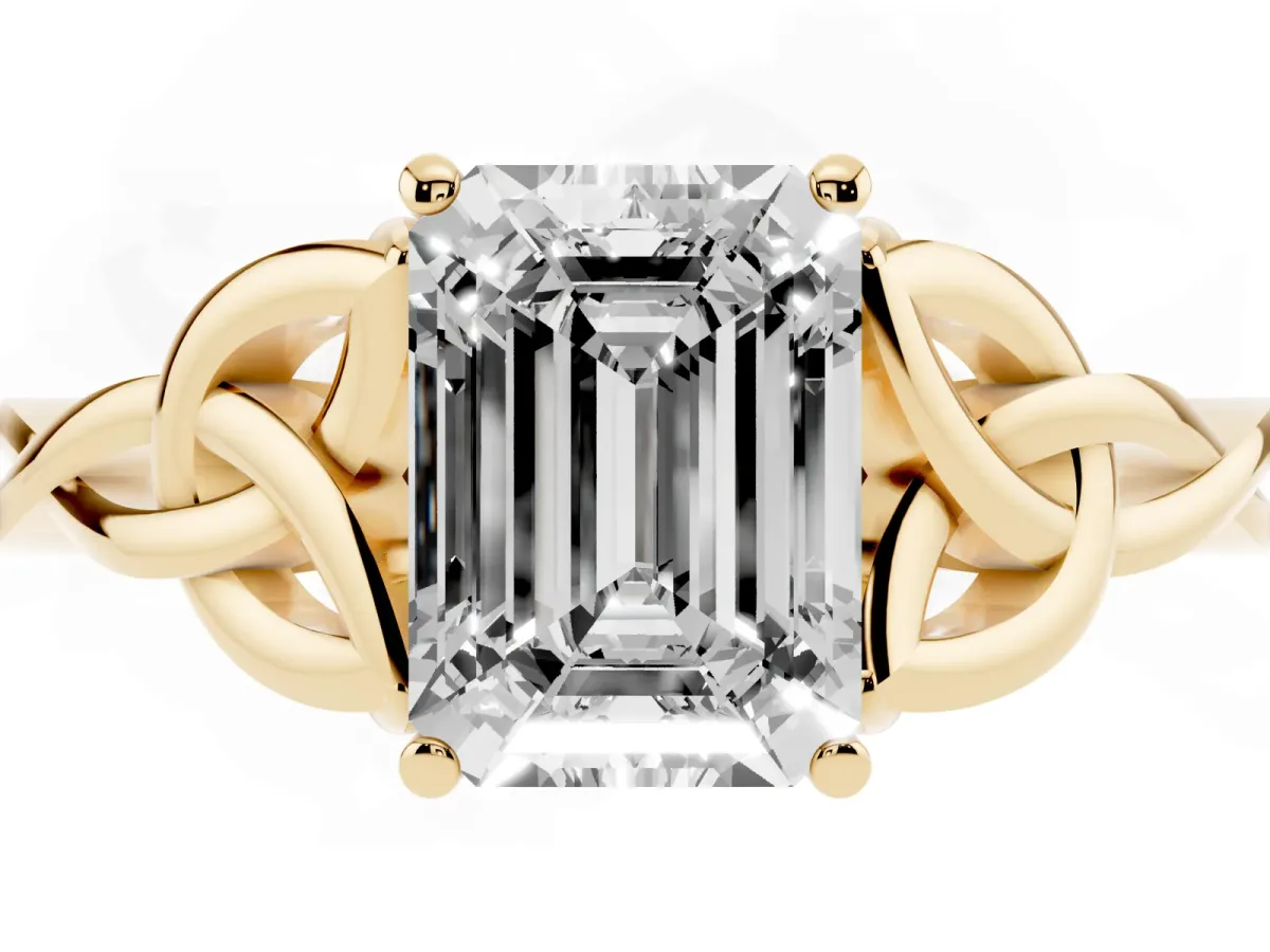 Emerald Cut Diamond Solitaire Engagement Ring with Celtic Knot Band and Four-Prong Setting Yellow gold