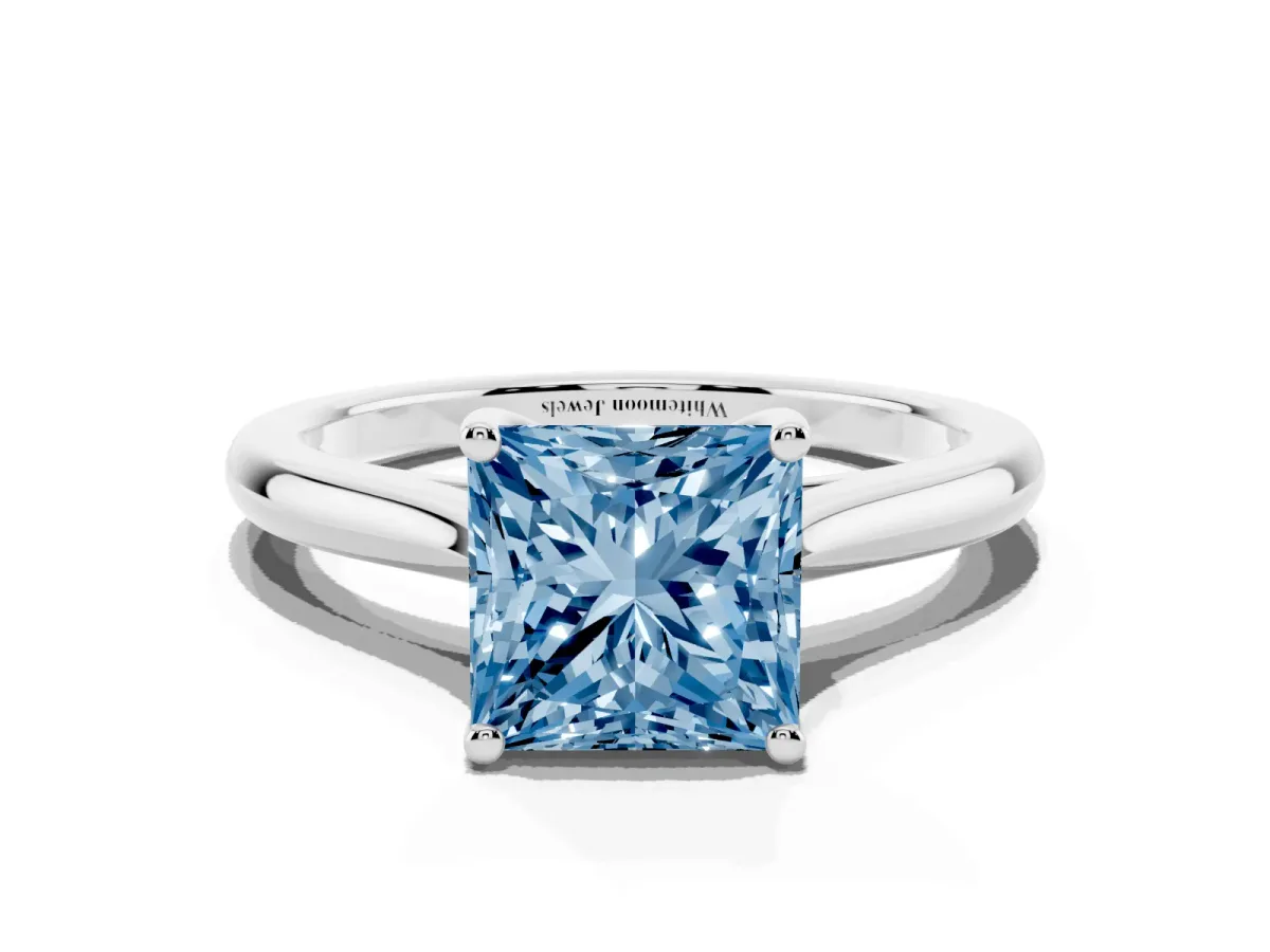 Fancy Blue Princess Cut Cut Solitaire Ring with Cathedral Band and Four-Prong Setting Silver