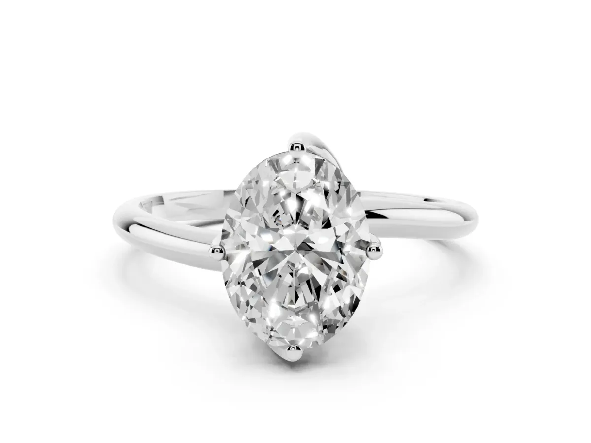 Oval Cut Diamond Solitaire Engagement Ring with Four-Prong Setting and Classic Band Silver