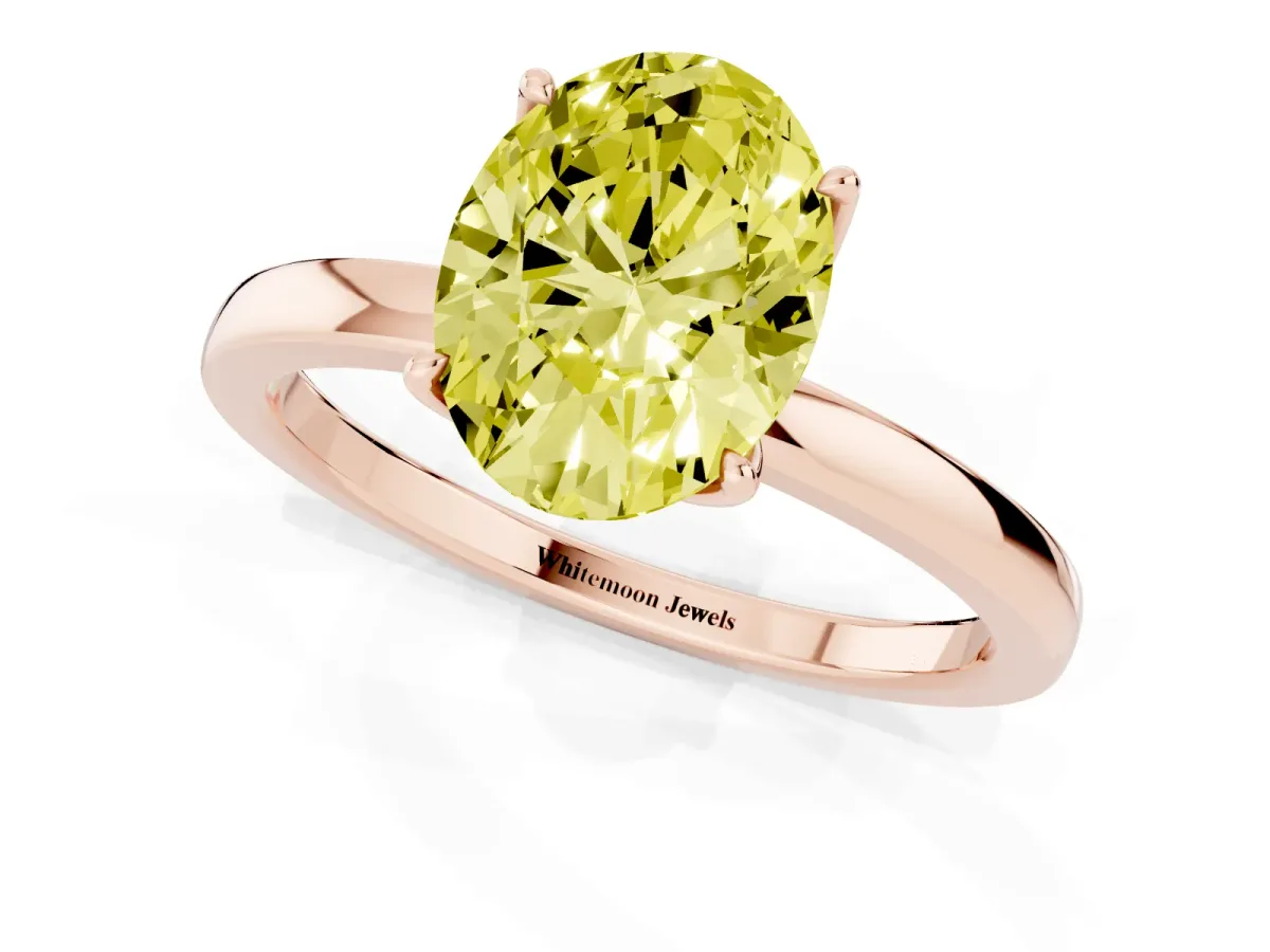Fancy Yellow Oval Cut Diamond Solitaire Ring with Thin Band and Prong Setting Rose gold