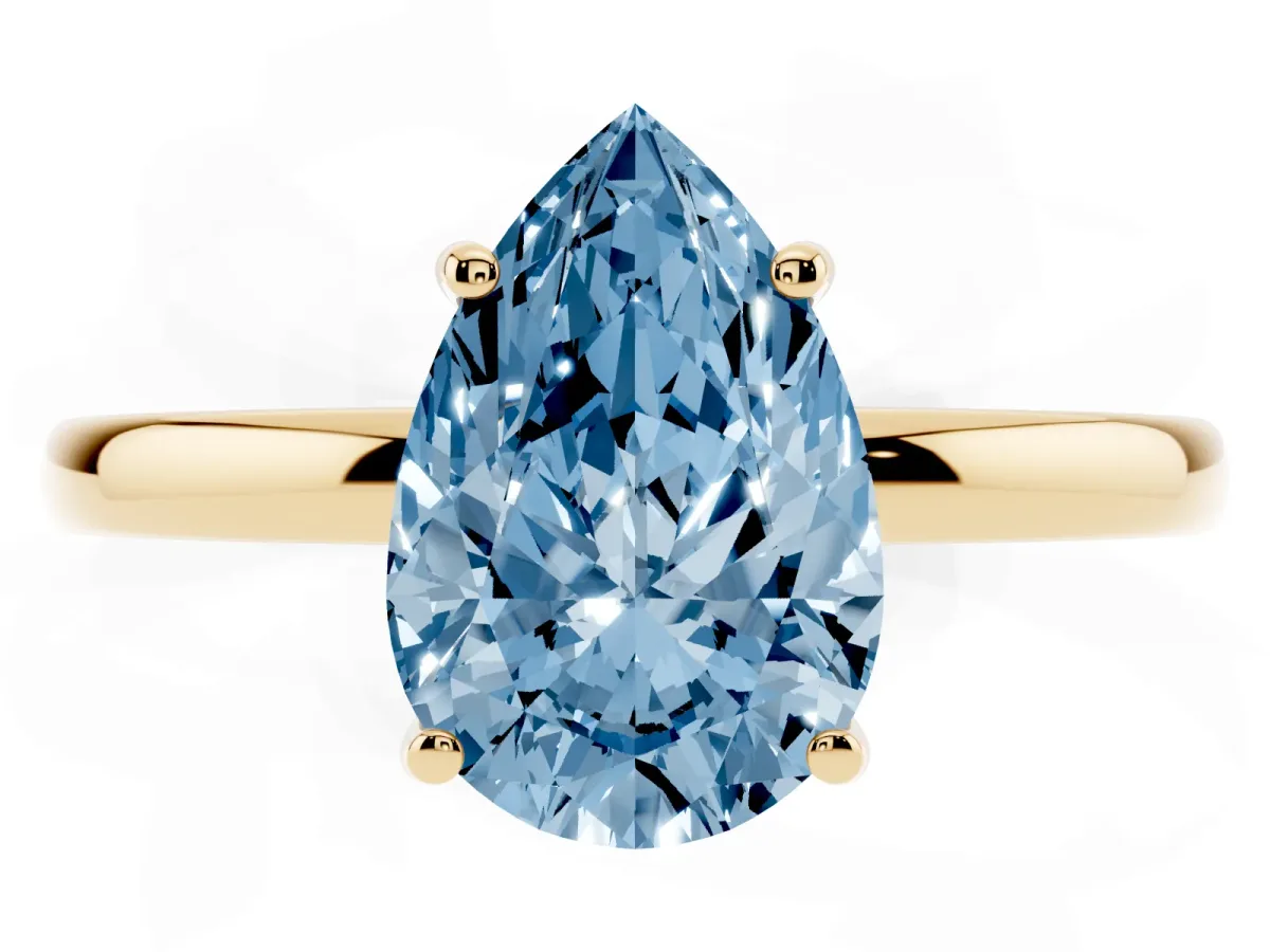 Fancy Blue Pear Cut Solitaire Diamond Ring with Prong Setting and Plain Band Yellow gold