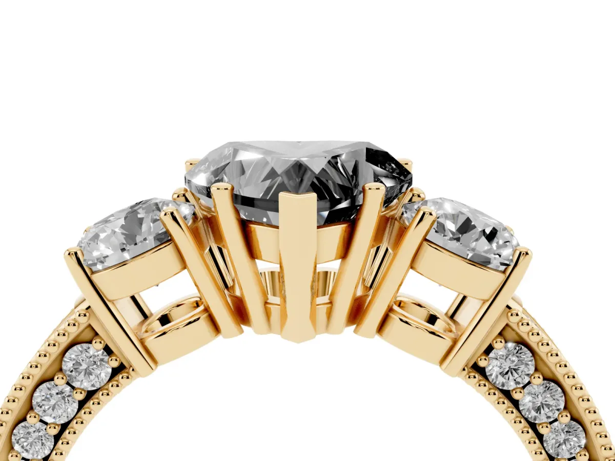 Fancy Black Heart Cut Three-Stone Diamond Ring with Pavé Band and Four-Prong Setting Yellow gold