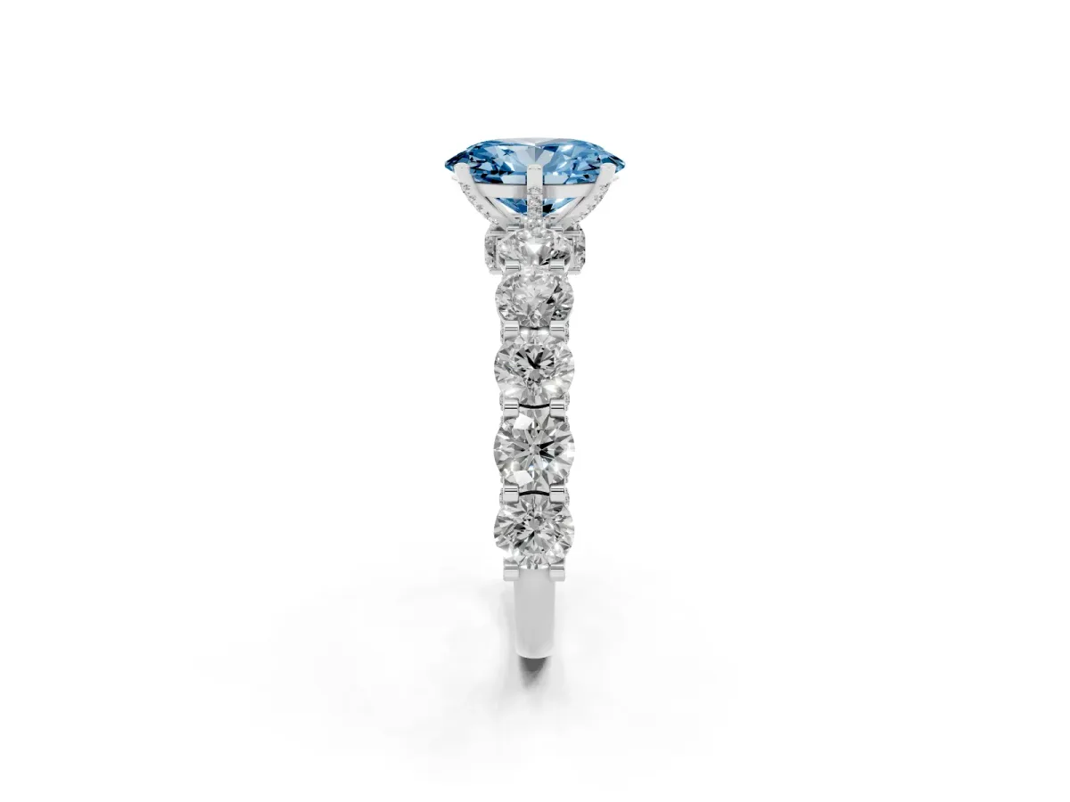 Fancy Blue Oval Cut Diamond Side Stone Engagement Ring with Four-Prong Setting Platinum