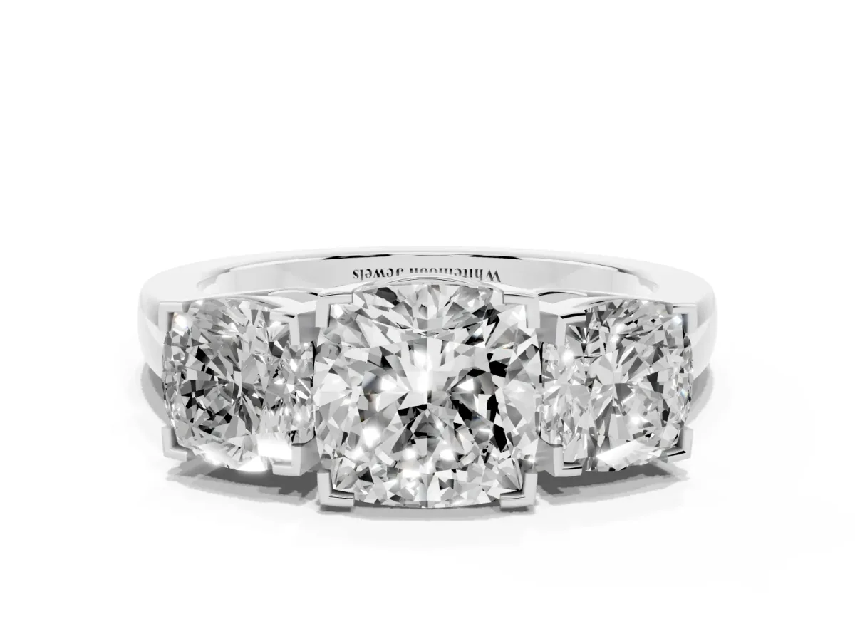 Three-Stone Cushion Cut Cut Diamond Ring with Channel Set Band and Four-Prong Setting Silver