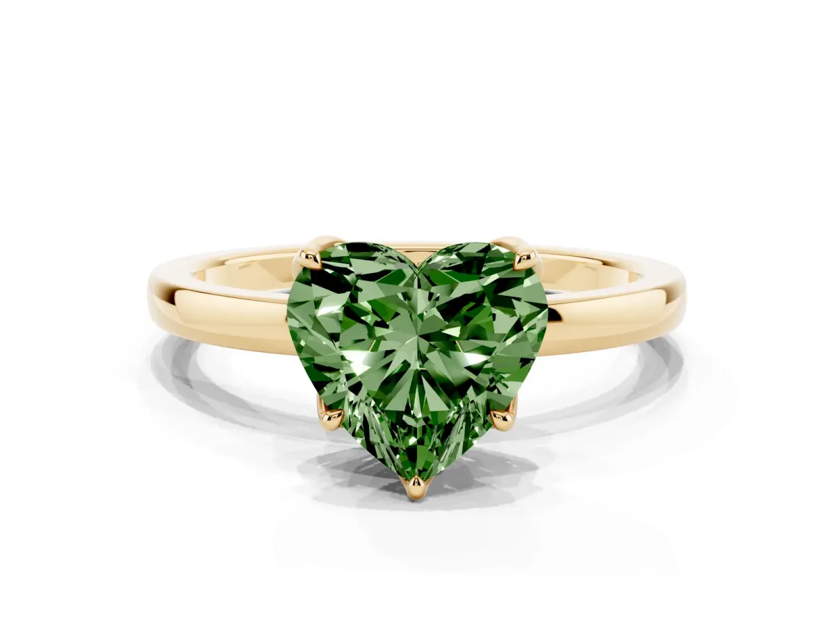 Fancy Green Heart Cut Diamond Solitaire Ring with Thin Band and Prong Setting Yellow gold