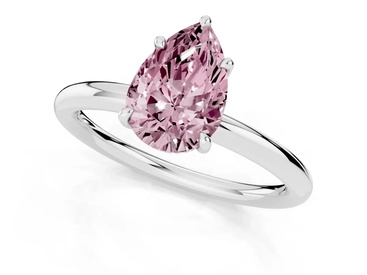 Fancy Pink Pear Cut Diamond Solitaire Ring with Thin Band and Four-Prong Setting Silver