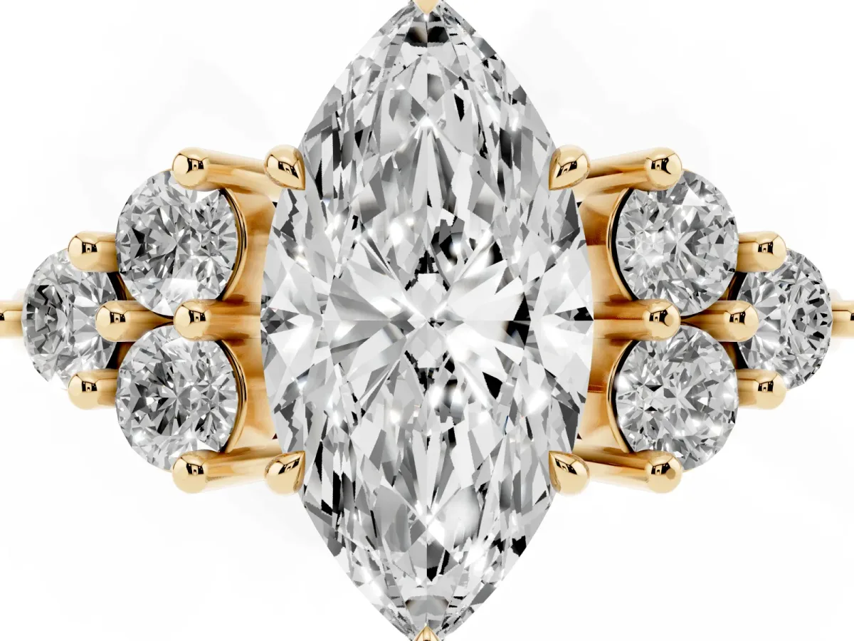 Marquise Cut Brilliant Diamond Cluster Accent Solitaire Ring with Prong Setting Yellow gold