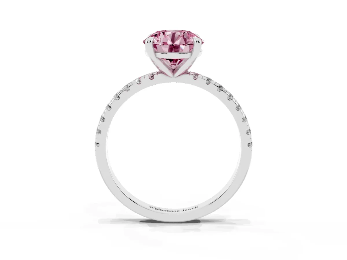 Fancy Pink Round Cut Diamond Brilliant Solitaire Ring with Pavé Band and Four-Prong Setting Silver