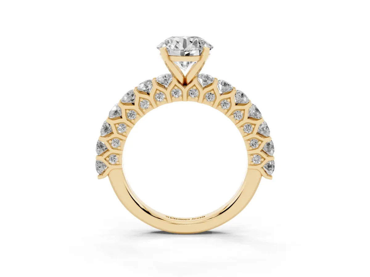 Round Cut Diamond Solitaire Ring with Shared Prong Pavé Band and Four-Prong Setting Yellow gold