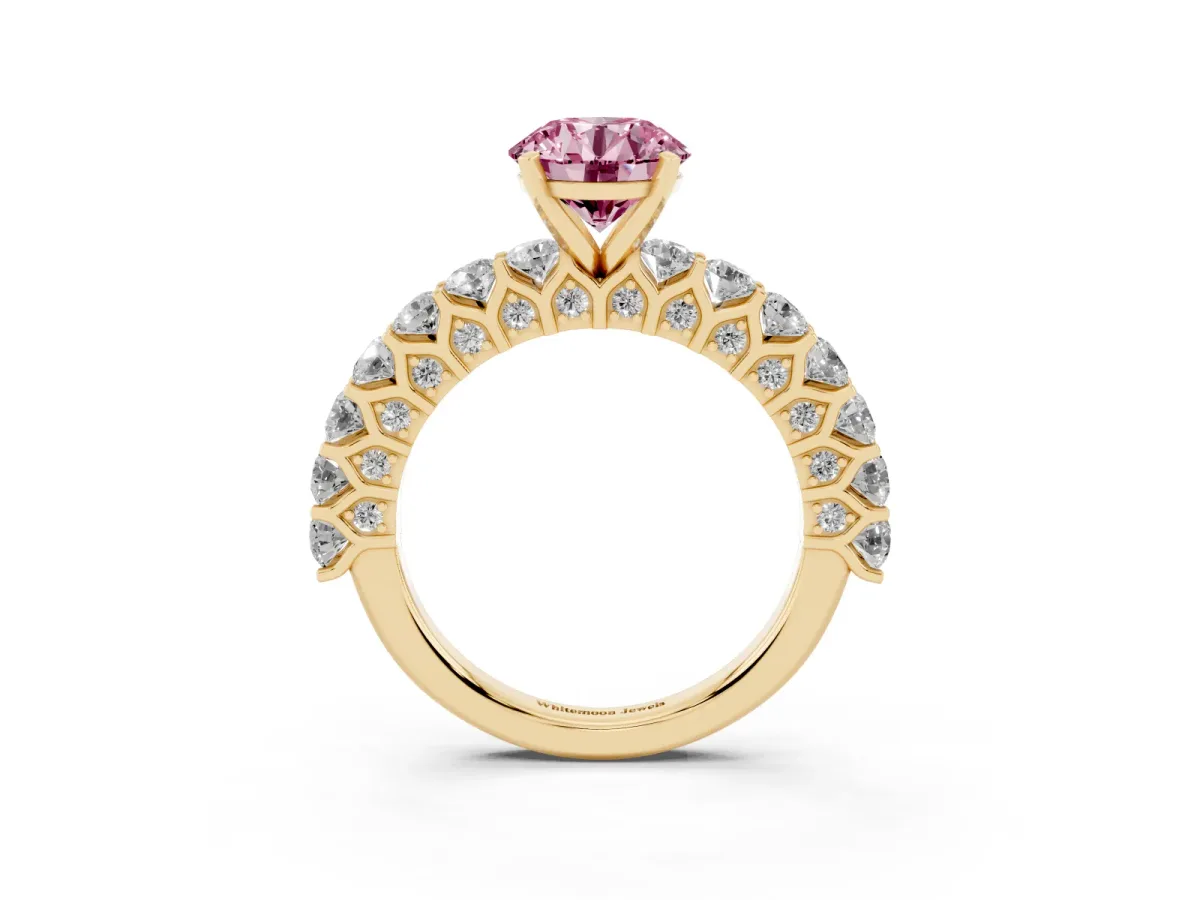 Fancy Pink Round Cut Diamond Solitaire Ring with Shared Prong Pavé Band and Four-Prong Setting Yellow gold