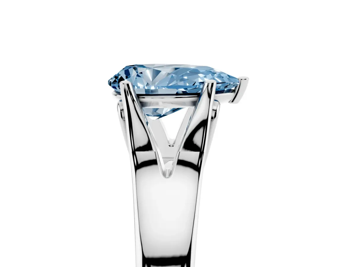 Fancy Blue Pear Cut Solitaire Diamond Ring with Cathedral Band and Four-Prong Setting Platinum