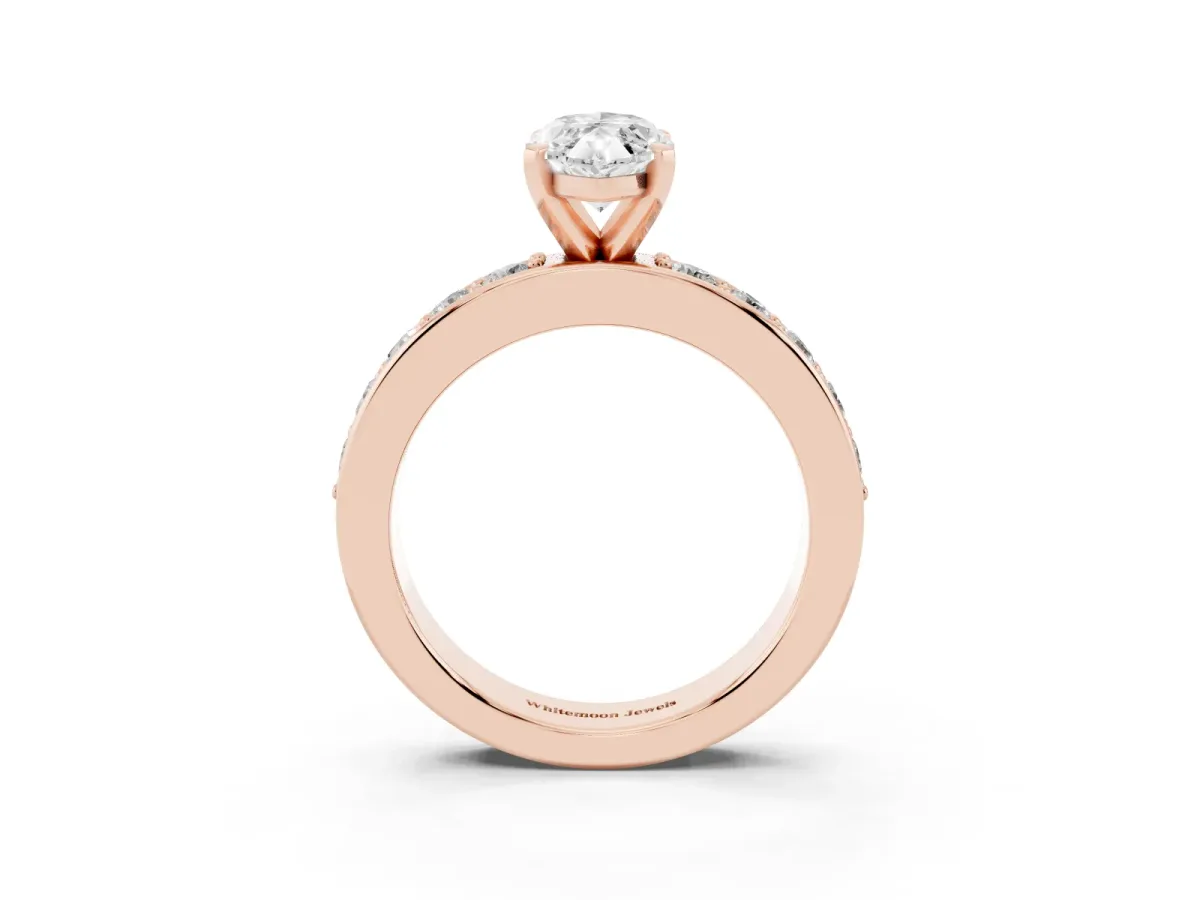 Marquise Cut Diamond Engagement Ring with Channel Set Round Band and Prong Setting Rose gold