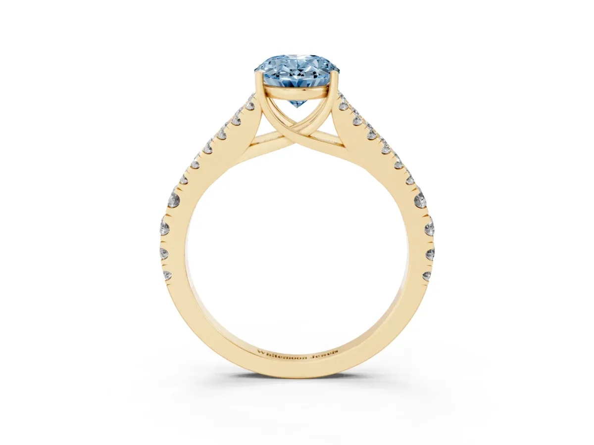 Fancy Blue Oval Cut Diamond Split Shank Engagement Ring with Round Pavé and Prong Setting Yellow gold