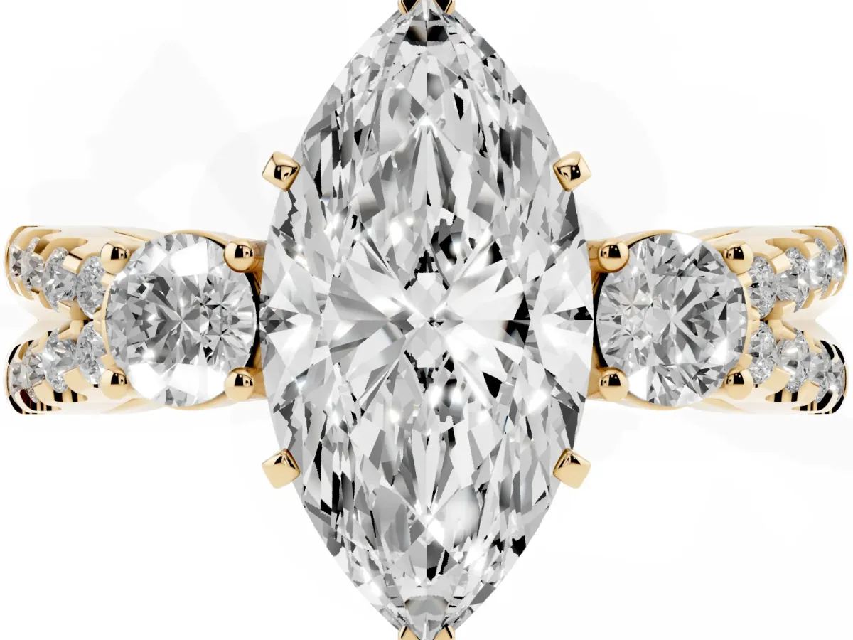Marquise Cut Diamond Three-Stone Ring with Pavé Split Shank and Four-Prong Setting Yellow gold