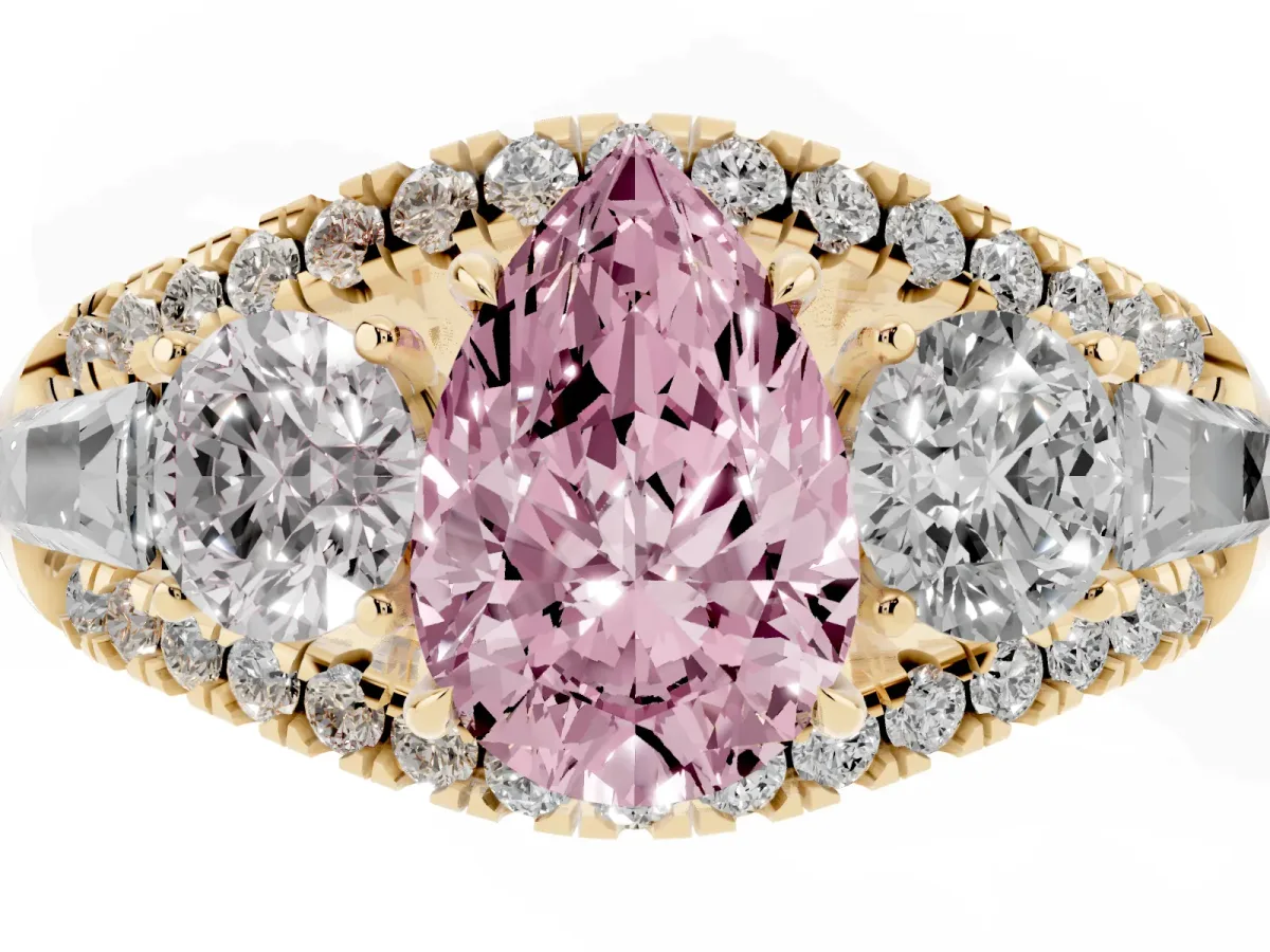 Fancy Pink Three-Stone Pear Cut Diamond Engagement Ring with Pave Band and Prong Setting Yellow gold