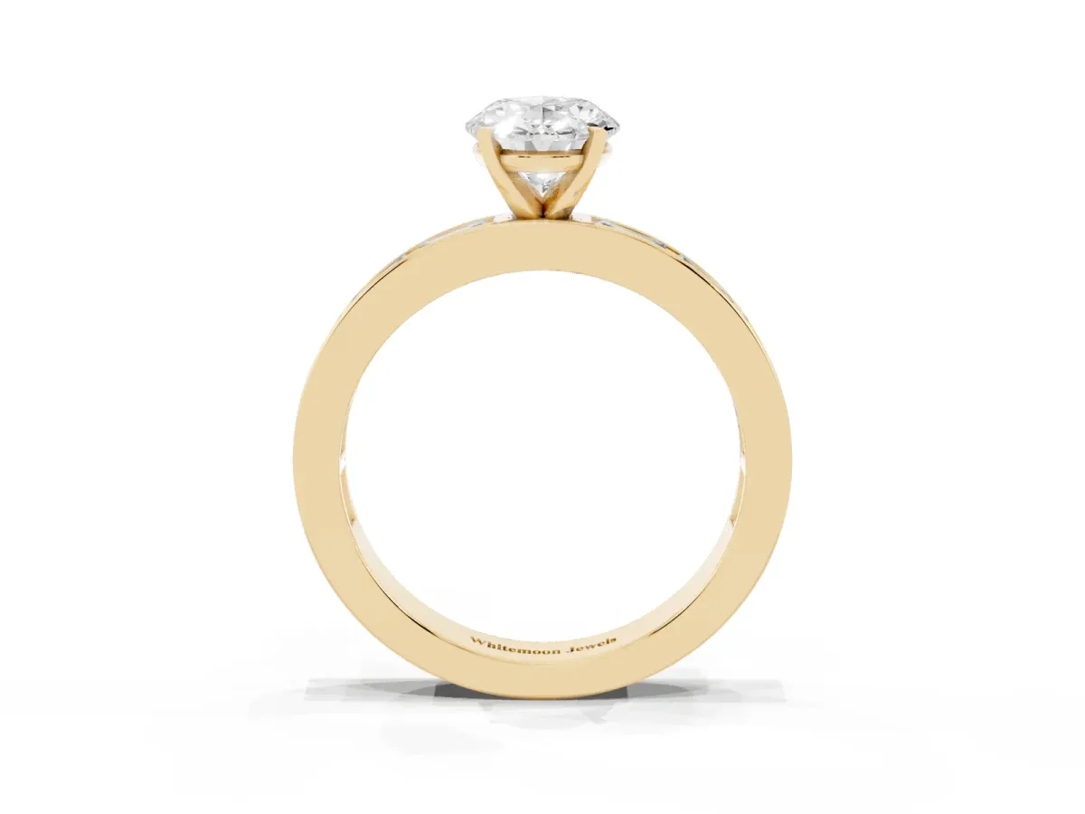 Oval Cut Solitaire Diamond Ring with Channel-Set Baguette Band and Four-Prong Setting Yellow gold