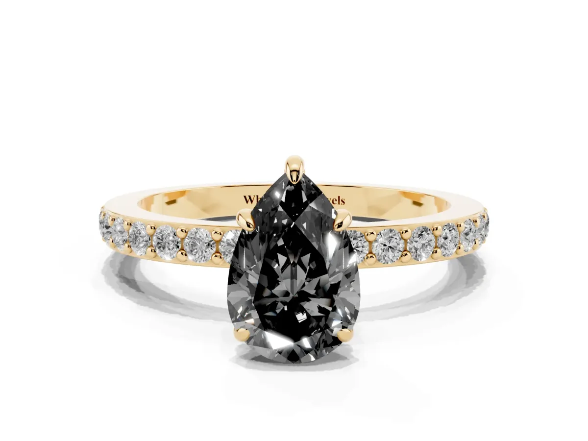 Fancy Black Pear Cut Diamond Pavé Engagement Ring with Round Accents and Prong Setting Yellow gold