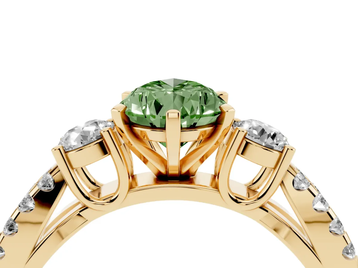 Fancy Green Pear Cut Diamond Three-Stone Ring with Pavé Split Shank and Four-Prong Setting Yellow gold