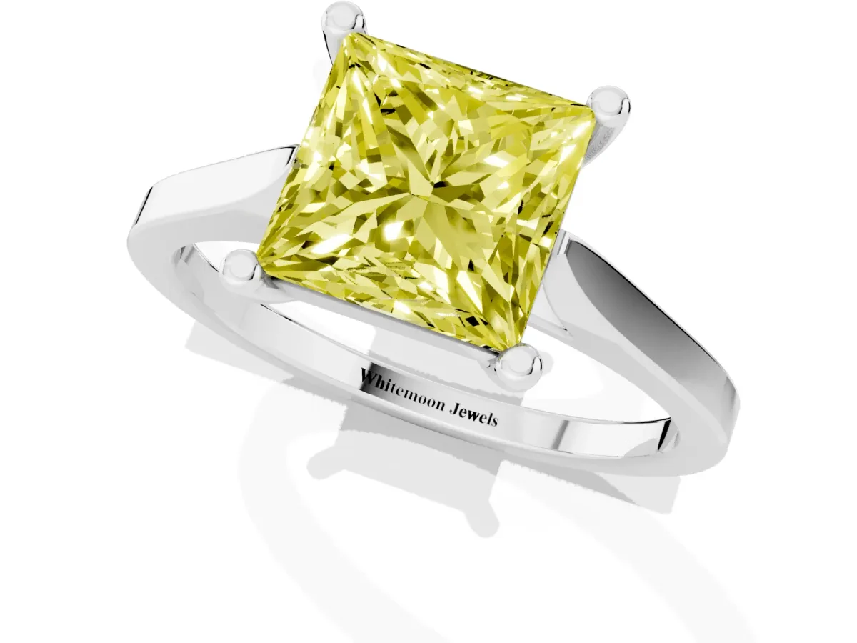 Fancy Yellow Princess Cut Solitaire Diamond Ring with Four-Prong Setting and Tapered Band White gold