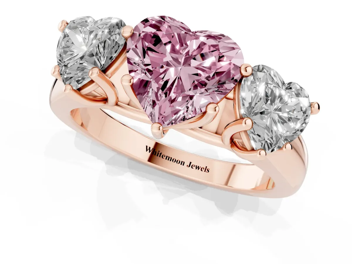 Fancy Pink Heart Cut Three-Stone Diamond Ring with Prong Setting on a Classic Band Rose gold