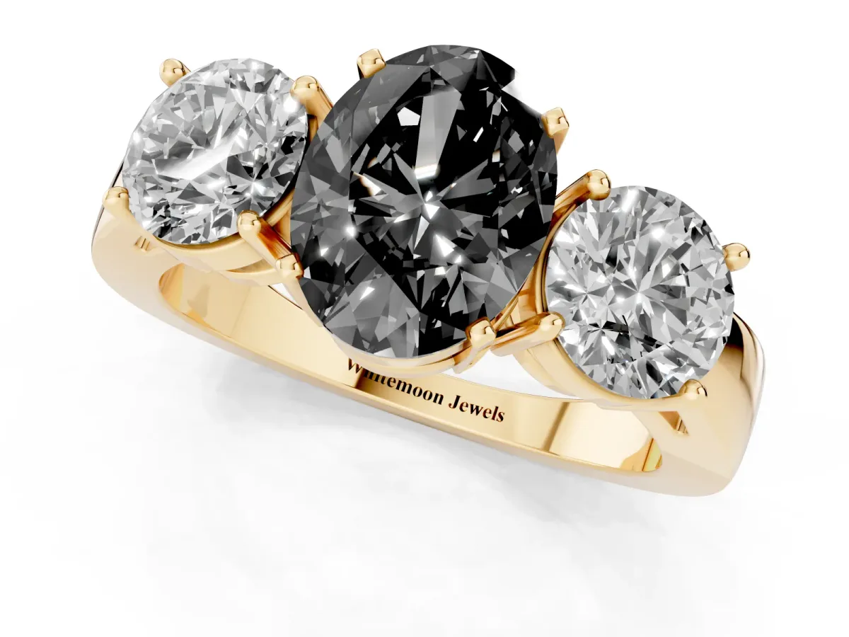 Fancy Black Three-Stone Oval Cut Diamond Ring with Round Side Stones, Classic Band, and Four-Prong Setting Yellow gold